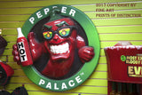 A Museum Quality Print of A Red Hot Chili Pepper on the Wall. This funny advertising scene is from a shop called Pepper Palace in downtown Gatlinburg