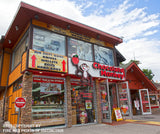 An archival premium Quality art Print of the Chocolate Monkey and Unique Shop on Top at Gatlinburg Tennessee for sale by Brandywine General Store