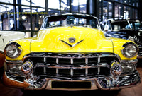 A premium print of a Shiny Chrome Grille on a Bright Yellow Antique Car