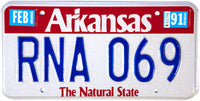 A 1991 Arkansas passenger car license plate which is unused grading near mint