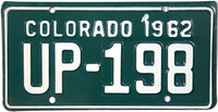 An unused classic 1962 Colorado Motorcycle License Plate for sale at Brandywine General Store in excellent condition