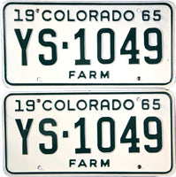 A pair of 1965 Colorado Farm License Plates for sale at Brandywine General Store, which will come in their own envelope as issued by the CO DMV