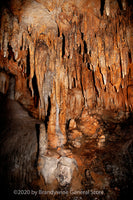 Luray Cavern's Ceiling full of Stalactites with smaller formations on the cave floor