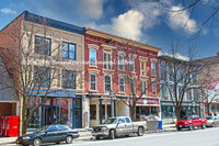 An art print of a street scene in the baseball town of Cooperstown NY