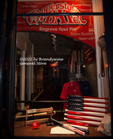 A premium quality art print of Cooperstown Patriotic Baseball Bat Display at Night