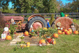 A premium art print of Fall Display with Tractor and Pumpkins for sale by Brandywine General Store.