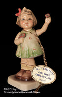 A Goebel Hummel Forever Yours Figurine with Trademark 7