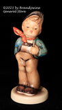 A Goebel Hummel Lucky Fellow #560 0 figurine with trademark 7
