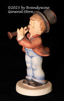 A Goebel Hummel Serenade figurine from trademark 6