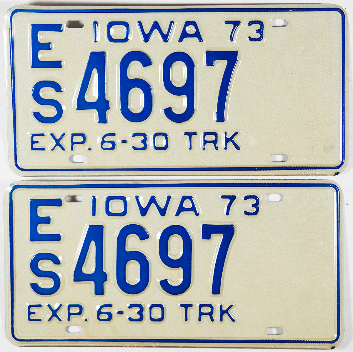 A pair of NOS 1973 Iowa Truck License Plates