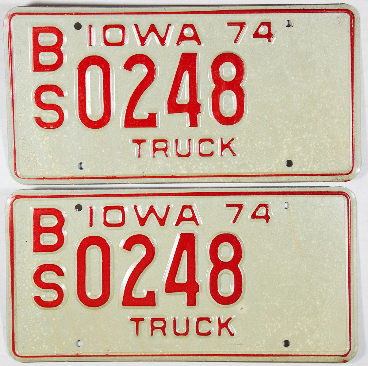 A pair of NOS 1974 Iowa Truck License Plates