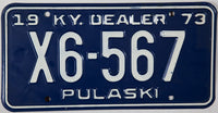 A 1973 Kentucky Dealer License Plate