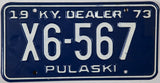 A 1973 Kentucky Dealer License Plate