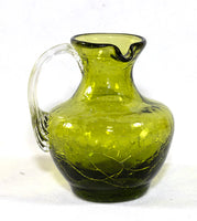 A Kanawha small light olive crackle glass pitcher with the spout on the side
