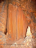 A fine art print of a large Red Waterfall in Luray Caverns