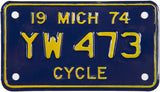 A NOS 1974 Michigan Motorcycle License Plate for sale by Brandywine General Store in near mint condition