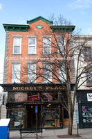 An art print of Mickey's Place in Cooperstown New York selling baseball items