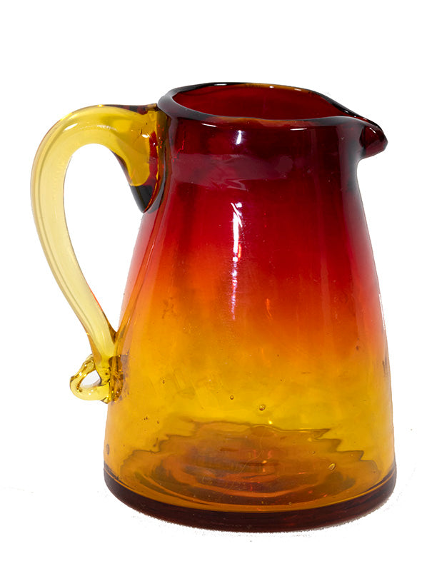 A Pilgrims hand blowm mini amberina pitcher with gold color handle