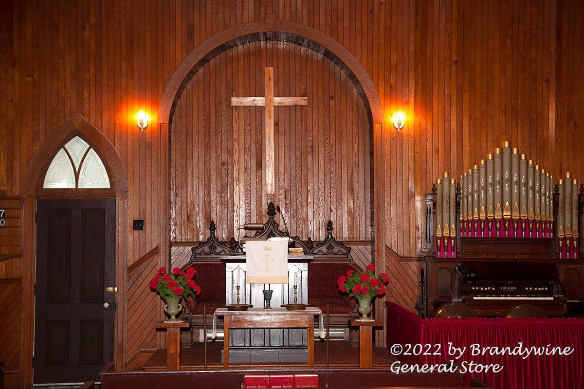 An interor view of 1904 Presbyterian Church showing the pulpit and pipe organ