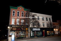 A premium quality art print of Shoeless Joe's and Mickey's Place in Cooperstown at Night 
