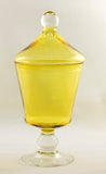 A West Virginia Glass company almost transpearant yellow compote with foot and lid