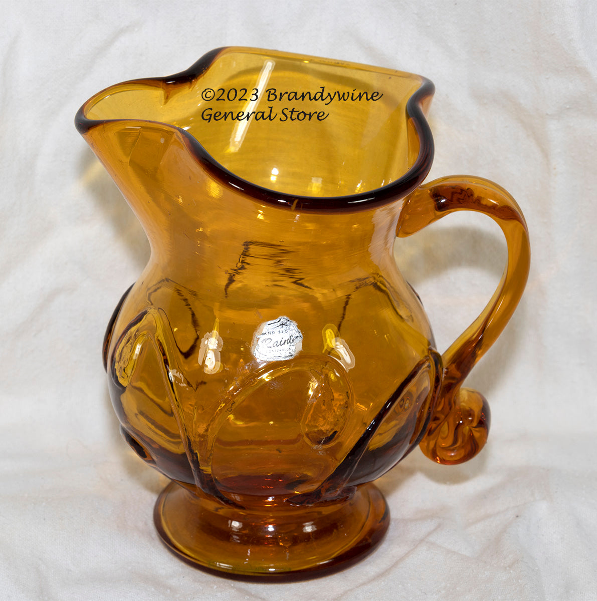 A small Rainbow amber mid century style style pitcher