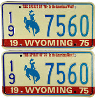 A pair of classic 1975 Wyoming passenger car license plates for sale by Brandywine General Store in unsued near mint condition