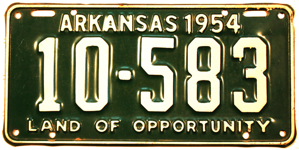 A 1954 Arkansas automobile passenger license plate grading New Old Stock Excellent