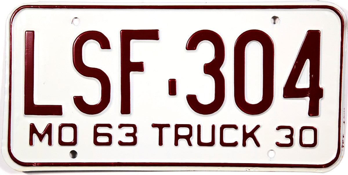 A NOS classic 1963 Missouri local truck license plate for sale by Brandywine General Store in excellent or better condition with original wrapper