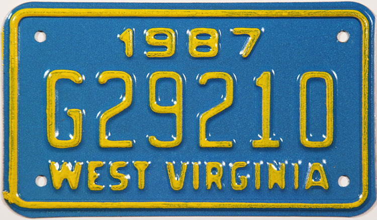 A 1987 West Virginia NOS motorcycle license plate